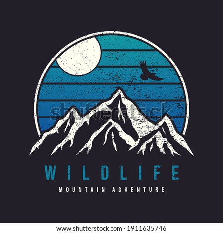 Mountain typography graphics for slogan tee shirt with eagle. Mountain adventure print for apparel, t-shirt design with grunge. Wildlife slogan. Vector illustration.