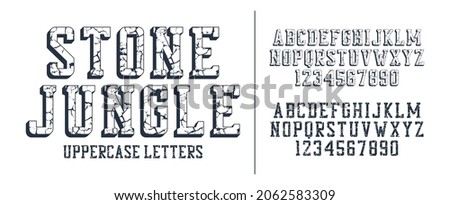 Cracked stone display font set. Retro style typeface with uppercase letters and numbers. Vector.