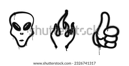 Graffiti drawing symbols set. Painted graffiti spray pattern of UFO alien face, flame and thumb up - gesture of like. Spray paint elements. Street art style illustration. Vector illustration.