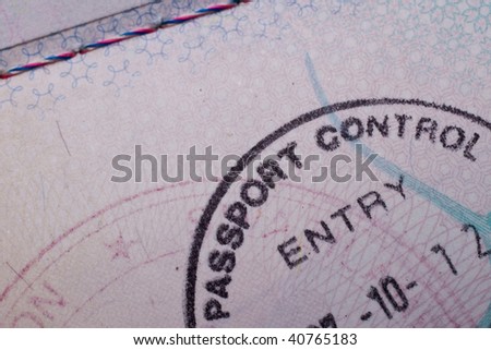 A passport control stamp in a British passport