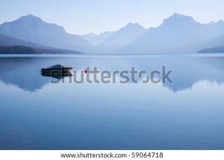 Peaceful landscape of  a power boat moored in the water