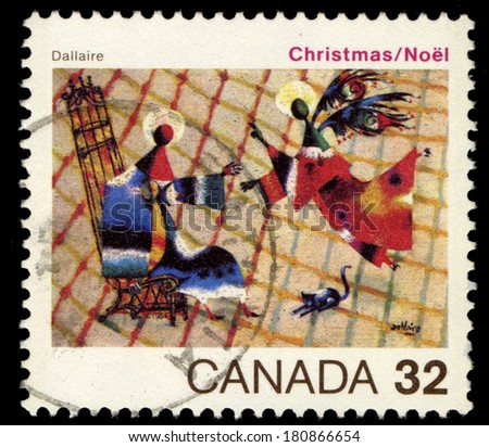 CANADA - CIRCA 1984: A stamp printed in Canada shows a painting The Annunciation by Jean Dallaire, circa 1984