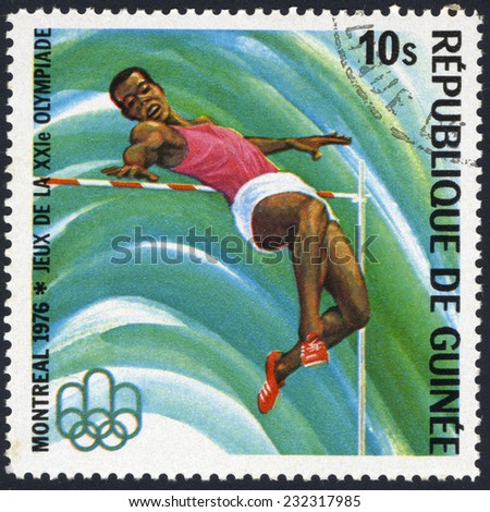 REPUBLIC OF GUINEA - CIRCA 1976: A stamp printed in Republic of Guinea shows high-jumper , series Montreal Olympics, circa 1976