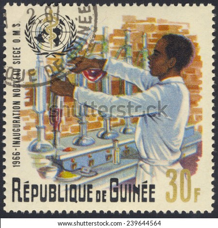 REPUBLIC OF GUINEA - CIRCA 1966: A stamp dedicated World Health Organization shows doctor, title Ã¢Â?Â?Inauguration nouveau siege OMSÃ¢Â?Â�, circa 1966