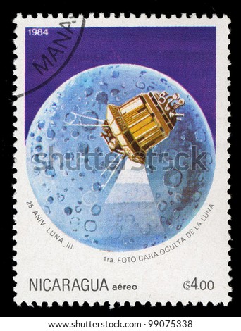 NICARAGUA - 1984: A stamp printed in Nicaragua shows Luna 3 over the moon, circa 1984