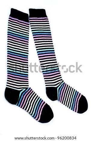 Stripped multicolored long socks isolated on white