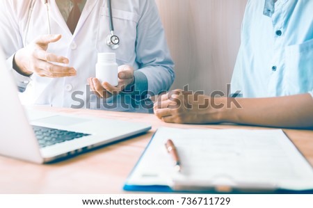 Similar – Image, Stock Photo caucasian doctor man holding test tube with blood for 2019-nCoV analyzing. Chinese Coronavirus blood test concept. Covid-2019