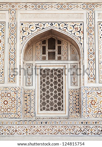 AGRA, INDIA - APRIL 09: Pattern on Taj Mahal on April 09, 2012 in Agra, India. Taj Mahal is widely recognized as the jewel of Muslim art and one of the universally masterpieces of the world