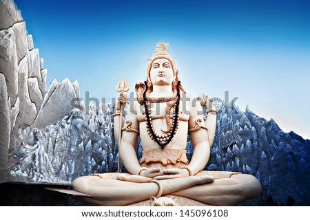 BANGALORE, INDIA - MARCH 27: Big Lord Shiva statue sitting in lotus with trident on March 27, 2012 in Bangalore, India. This Shiva Statue is highest in the world - 65 feet high.