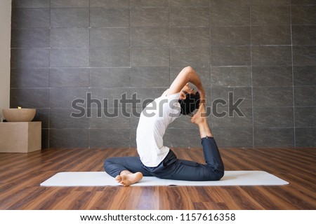 Similar – Image, Stock Photo Flexible young yogi man standing on beach