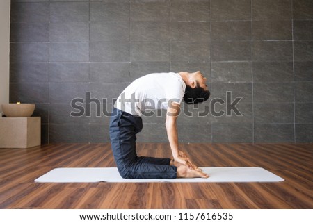 Similar – Image, Stock Photo Flexible young yogi man standing on beach