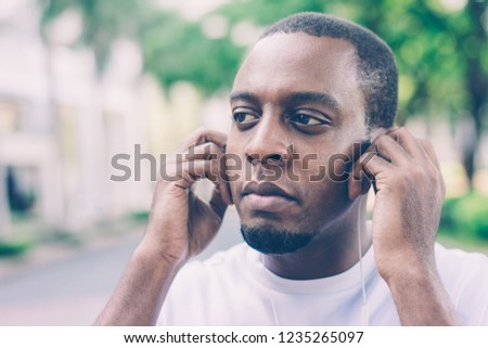 Similar – Image, Stock Photo closeup of a black man recording a voice message