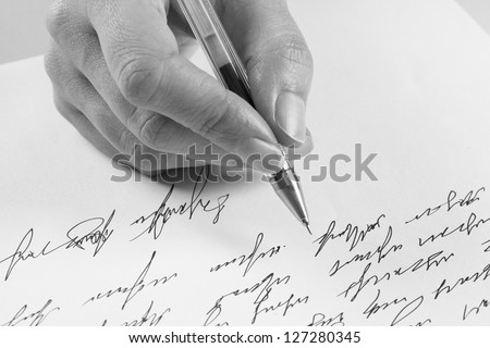 woman writes a handwritten letter
