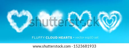 Set of various fluffy cloud heart frames isolated on blue sky. Romantic white half transparent heart shaped  clouds. Vector illustration for your graphic design.