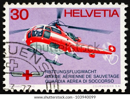 SWITZERLAND - CIRCA 1972: a stamp printed in the Switzerland shows Red Cross Rescue Helicopter, circa 1972