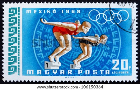 HUNGARY - CIRCA 1968: a stamp printed in the Hungary shows Women Swimmers, Summer Olympic sports, Mexico 68, circa 1968