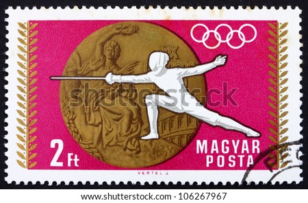 HUNGARY - CIRCA 1969: A stamp printed in the Hungary shows Fencing, Summer Olympic sports, Mexico 68, circa 1969