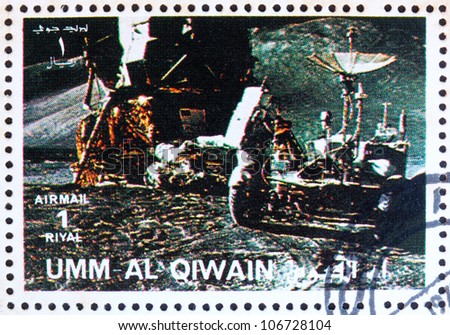UMM AL-QUWAIN - CIRCA 1972: a stamp printed in the Umm al-Quwain shows Astronaut, Moon Rover and Lunar Module, Moon-landing, Apollo, circa 1972
