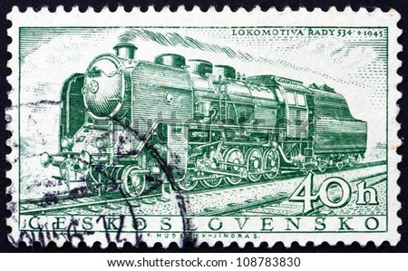 CZECHOSLOVAKIA - CIRCA 1956: a stamp printed in the Czechoslovakia shows Steam Locomotive, 1945, circa 1956