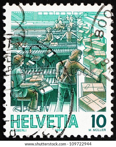 SWITZERLAND - CIRCA 1986: a stamp printed in the Switzerland shows Parcel Sorting, Mail Handling, circa 1986