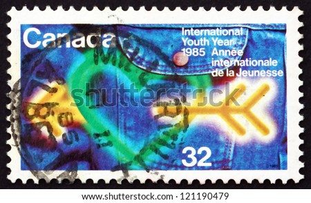 CANADA - CIRCA 1985: a stamp printed in the Canada shows Heart, Arrow and Jeans, International Youth Year, circa 1985