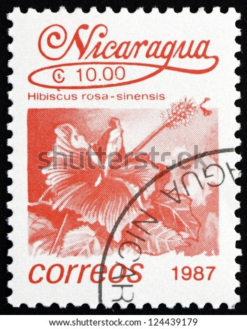 NICARAGUA - CIRCA 1987: a stamp printed in Nicaragua shows Chinese Hibiscus, Hibiscus Rosa-sinensis, Flower, circa 1987