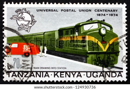 TANZANIA, KENYA, UGANDA - CIRCA 1974: a stamp printed in the Tanzania shows Mail Train and Truck, circa 1974