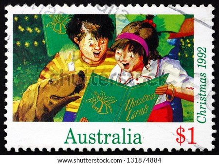 AUSTRALIA - CIRCA 1992: a stamp printed in the Australia shows Boy and Girl Singing Christmas Carol, Christmas, circa 1992
