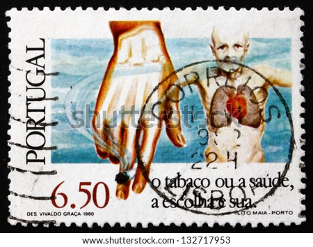 PORTUGAL - CIRCA 1980: a stamp printed in the Portugal shows Man with Diseased Heart and Lungs, Hand Holding Cigarette, Anti-smoking Campaign, circa 1980
