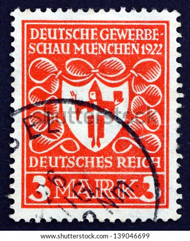 GERMANY - CIRCA 1922: a stamp printed in the Germany shows Arms of Munich, Munich Industrial Fair, circa 1922