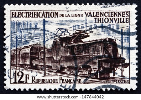 FRANCE - CIRCA 1955: a stamp printed in the France shows Electric Train, Electrification of the Valenciennes Thionville Railroad Line, circa 1955