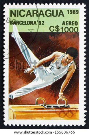 NICARAGUA - CIRCA 1989: a stamp printed in Nicaragua shows Pommel Horse, Gymnastics, 1992 Summer Olympics, Barcelona, Spain, circa 1989