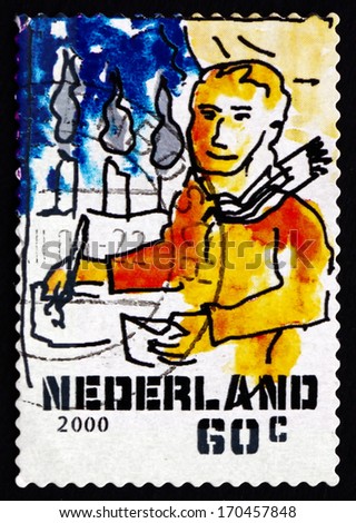 NETHERLANDS - CIRCA 2000: a stamp printed in the Netherlands shows Man Writing Letter, Christmas, circa 2000
