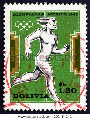 BOLIVIA - CIRCA 1969: a stamp printed in the Bolivia shows Woman Runner, 19th Olympic Games, Mexico City, 1968, circa 1969