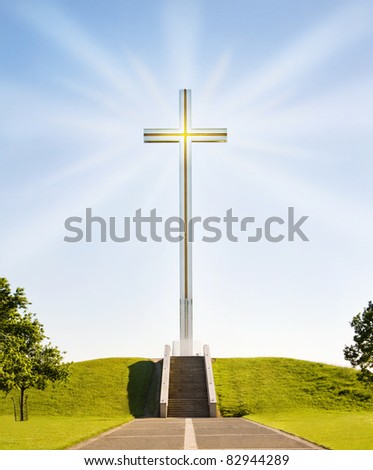 Shining Christian cross on the stairs to Heaven. The papal cross in Phoenix Park, Dublin, Ireland.