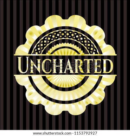 Uncharted golden emblem or badge