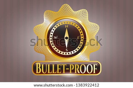  Gold shiny emblem with compass icon and Bullet-proof text inside