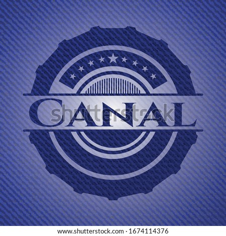 Canal badge with denim background. Vector Illustration. Detailed.
