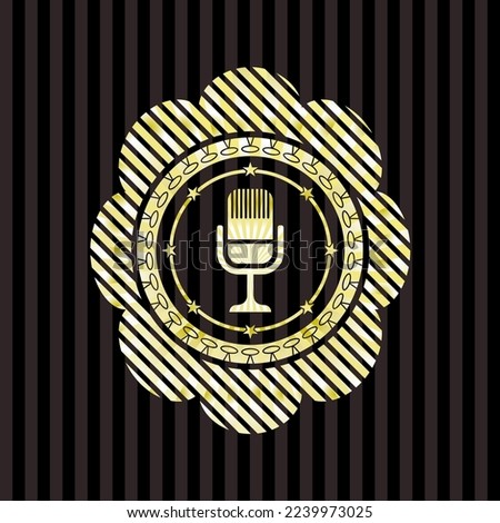 microphone icon inside golden badge. 