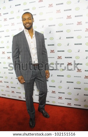 HOLLYWOOD - MAY 9, 2012: Old Spice guy Isaiah Mustafa walks the red carpet for the premiere of Mansome held at the Arclight Theatre May 9, 2012 Hollywood, CA.