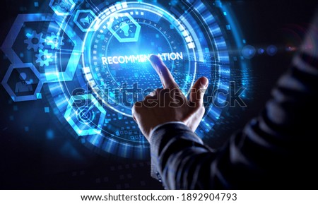 Business, Technology, Internet and network concept. Young business man working on the tablet of the future, select the virtual screen: Recommendation 商業照片 © 
