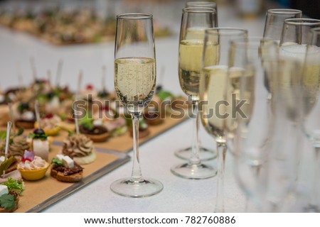 Catering Banquet table with canapes, snacks, festive table, slices, glasses Photo stock © 