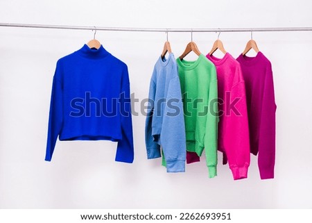 Similar – Image, Stock Photo Colorful Clothes Hanging For Sale