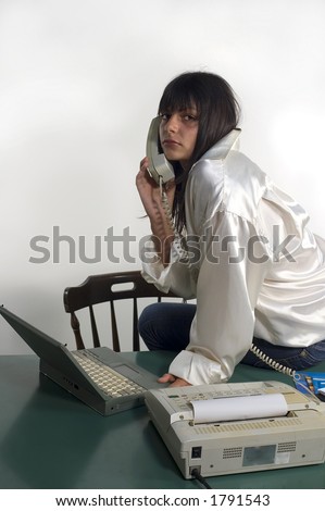 Businesswoman cell on phone at the office