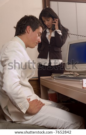 Business team at office, woman talking on phone