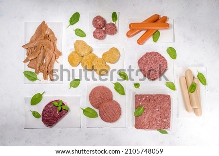 Similar – Image, Stock Photo Raw vegan cutlets on wooden board