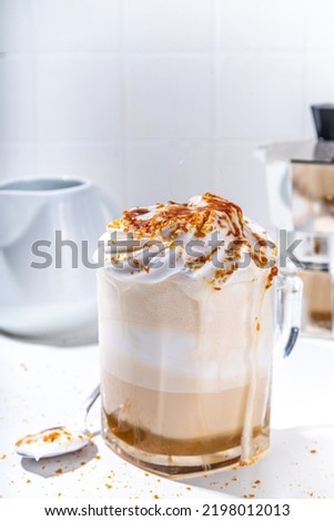 Similar – Image, Stock Photo Salted caramel frappe coffee served on glass