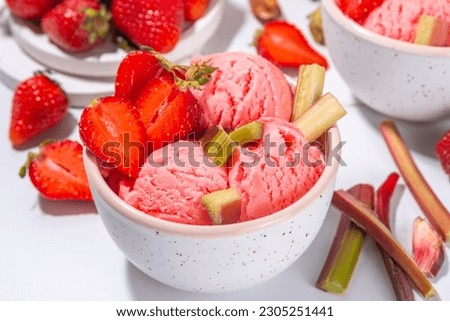 Similar – Image, Stock Photo Fresh strawberries and rhubarb on wooden table background with ingredients for tasty seasonal cooking or baking. Top view. Healthy clean food. Paleo dieting. Home cuisine. Garden fruits eating