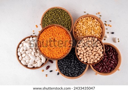 Similar – Image, Stock Photo Variation of nuts in a bowl on a beige linen tablecloth. Top view.