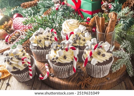 Similar – Image, Stock Photo Delicious fir tree with white chocolate, sugar pearls and red jam on dark plate in moody style